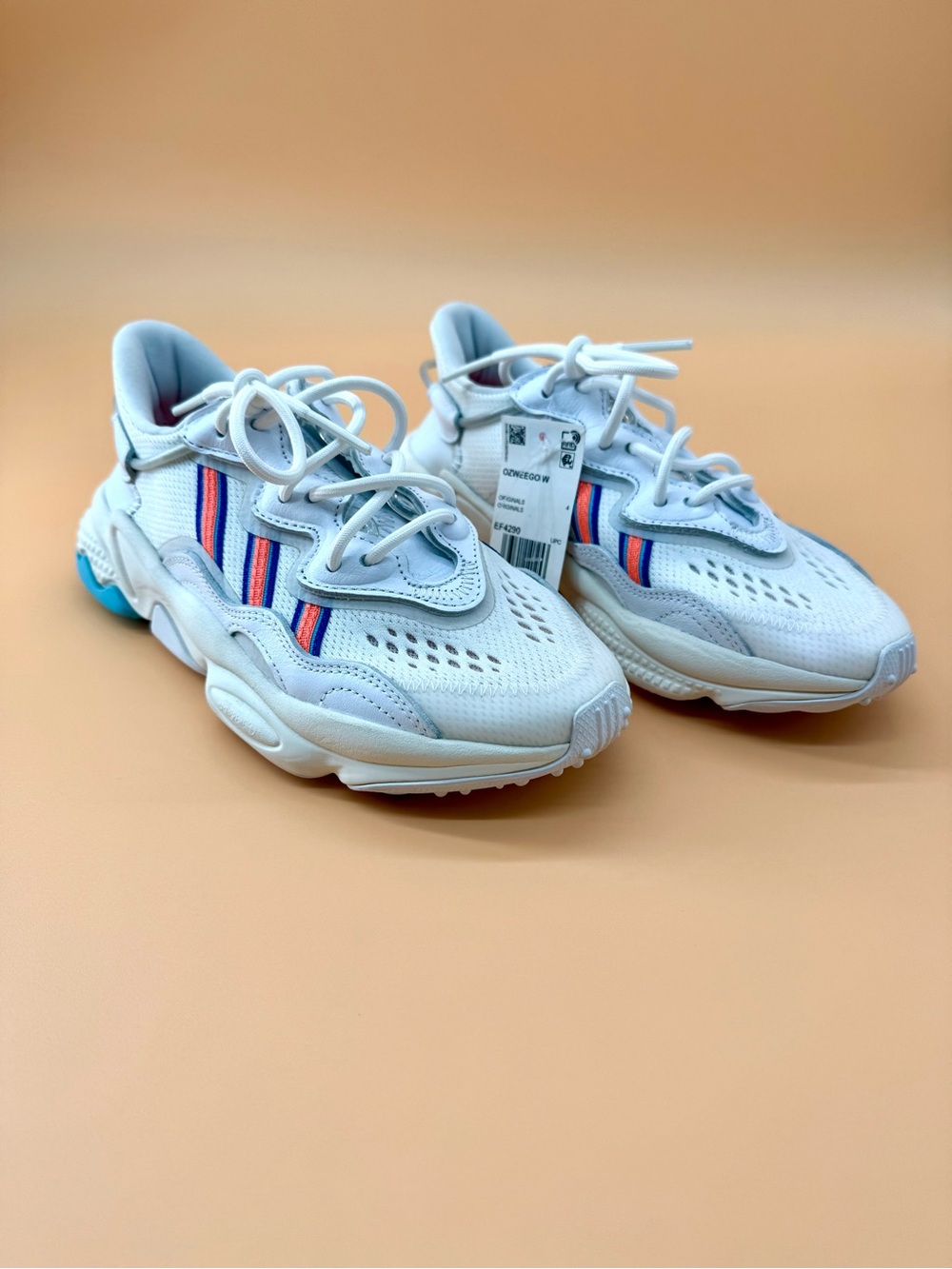 Adidas Ozweego White Sneakers with Blue‎ & Orange Accents